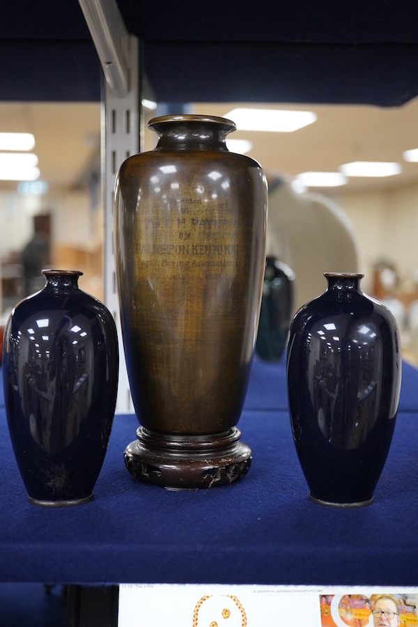 A Japanese presentation bronze and mixed metal vase on hardwood stand and a pair of cloisonne enamel vases (3), tallest 20cm. Condition - fair to good